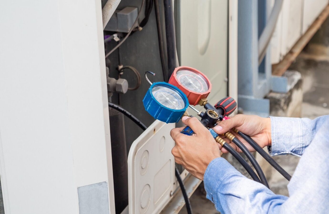 hvac technician working on air conditioning unit 2026 01 09 09 54 23 utc Large e1778274878448