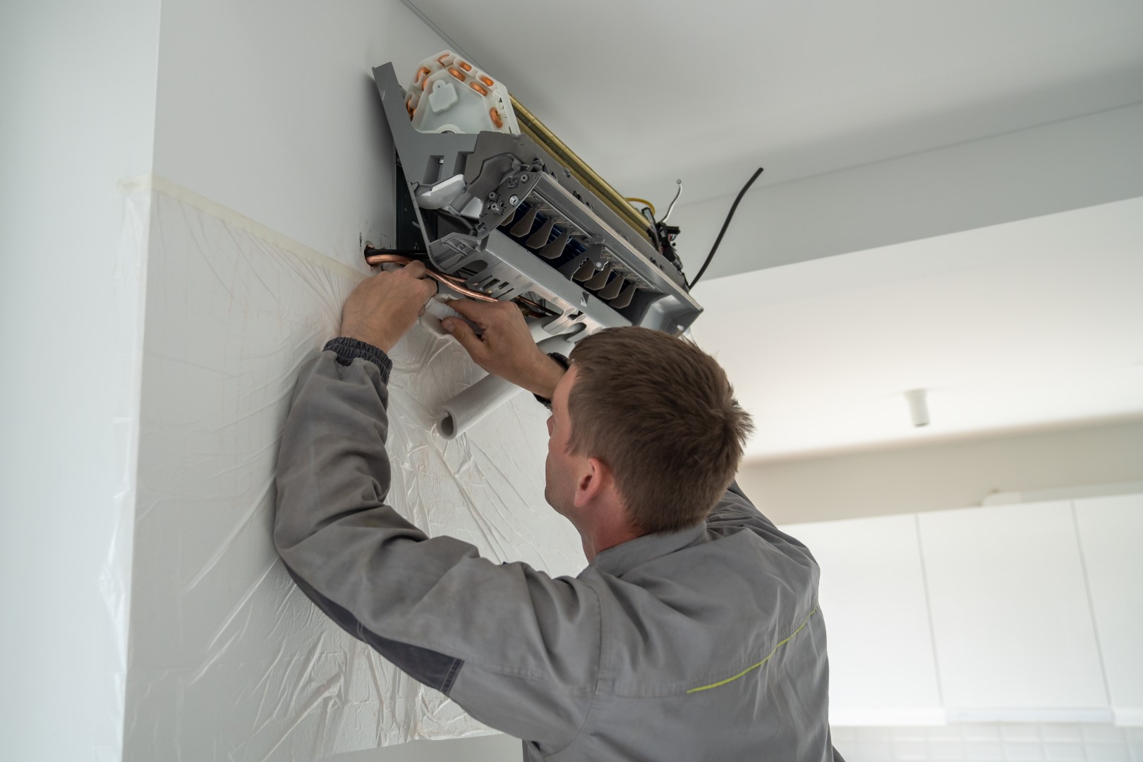 man installing air conditioning unit in home 2026 01 08 07 13 41 utc Large